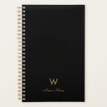Modern Black Gold Script Monogram Planer<br><div class="desc">Ein modernes,  elegantes Monogramm-Design mit handgeschriebener,  minimalistischer Schrifttyp-Schrift und serifenloser Blocktypografie auf elegantem schwarzen Hintergrund. Das Monogramm und der Name können leicht personalisiert werden.</div>