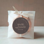 Modern Brown Monogram Minimalist Wedding Runder Aufkleber<br><div class="desc">Add a stylish finishing touch to your wedding stationery and favors with the Modern Brown Monogram Minimalist Wedding Classic Round Sticker, designed for couples who appreciate warm earthy tones and refined simplicity. Featuring a rich brown color palette paired with clean minimalist typography, this elegant sticker highlights a personalized monogram that...</div>