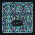 Modern Damask Art Deco Black Turquoise Blue Name Quadratische Wanduhr<br><div class="desc">Personalize your clock with monogram initials or a name for a beautiful decorative accent. You can easily delete the oval and text if you prefer it without the personalization. The design is created with the bold colors of black and turquoise teal blue with touches of magenta and chartreuse lime green....</div>