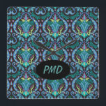 Modern Damask Art Deco Black Turquoise Blue Name Quadratische Wanduhr<br><div class="desc">Personalize your clock with monogram initials or a name for a beautiful decorative accent. You can easily delete the oval and text if you prefer it without the personalization. The design is created with the bold colors of black and turquoise teal blue with touches of magenta and chartreuse lime green....</div>
