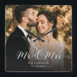 Modern Elegant Script Wedding Photo Newlywed Chic  Quadratische Wanduhr<br><div class="desc">This elegant script custom photo wall clock will be a beautiful keepsake of your wedding day! The unique calligraphy reads 'Mr and Mrs' alongside your personal family name. Add your favorite wedding photo and make this into a perfect gift for newlyweds,  an anniversary,  or vow renewal!</div>