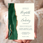 Modern Emerald Green Gold Agate Ivory Wedding Einladung<br><div class="desc">Der links Rand dieser eleganten,  modernen Hochzeitseinladung zeichnet sich durch einen smaragdgrünen Aquarellstreifen aus,  der mit vergoldetem Imitat-Glitzer bestickt ist. Der anpassbare Text kombiniert Handschrift,  Copperplate und kursivem Schriftart in smaragdgrün auf Elfenbeinhintergrund. Die Rückseite ist mit einem smaragdgrünen und goldgelben Dekor ausgestattet.</div>