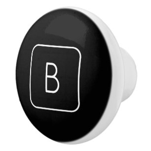 Modern gestyltes Anfangsmonogramm Weiß und Schwa Keramikknauf