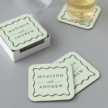 Modern Green Wavy Frame Wedding Rechteckiger Pappuntersetzer<br><div class="desc">Add a stylish touch to your wedding reception, rehearsal dinner, engagement party, or wedding shower with these Modern Green Wavy Frame paper coasters. The retro wedding coasters display the couple's names in bold green lettering surrounded by a green wavy border contrasting with a light green background. The trendy wedding coasters...</div>