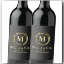 Modern metallic gold circle shape faux monogram weinetikett