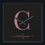 Modern Minimalistische Rose Gold Monogram Script N Quadratische Wanduhr<br><div class="desc">Chic Elegant Rosa Gold Monogram Script auf einer schicken Black Wall Uhr. Einfach mit Ihrem eigenen Namen und Ihren eigenen Details anpassen. Ideal für Ihren luxuriösen Lifestyle! Bitte kontaktieren Sie uns unter cedarandstring@gmail.com ,  wenn Sie Hilfe beim Design oder den passenden Produkten benötigen.</div>