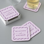 Modern Purple Wavy Frame Wedding Rechteckiger Pappuntersetzer<br><div class="desc">Add a stylish touch to your wedding reception, rehearsal dinner, engagement party, or wedding shower with these Modern Purple Wavy Frame paper coasters. The retro wedding coasters display the couple's names in bold purple lettering surrounded by a purple wavy border contrasting with a light purple background. The trendy wedding coasters...</div>