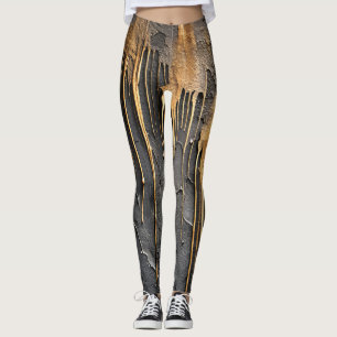 Moderne abstrakte schwarze und metallische goldene leggings