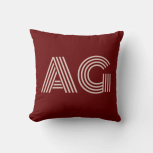 Moderne Beige- und Weinmonogramm Kissen