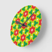 Moderne Blume zu grün und rot geometrisch gegliede Runde Wanduhr (Winkel)