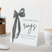 Moderne elegante Black Bow schätzt, wie viele Ring Sockelschild (In SItu)