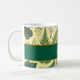 Moderne, elegante grüne Frühlingsstifte und Blätte Kaffeetasse