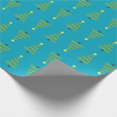 Moderne Feiertags-Weihnachtsbäume auf aquamarinem Geschenkpapier (Ecke)
