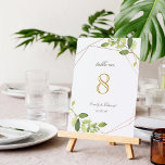 Moderne geometrische Greenerie Personalisierte Hoc Tischnummer<br><div class="desc">Maßgeschneiderte Hochzeitskarten mit modernem,  geometrischem Goldrahmen und Aquarelldesign. Die Tischnummer ist in einem modernen Design gestaltet. Personalisieren Sie mit den Namen der Braut und des Bräutigams und dem Hochzeitstag. Ideal für Hochzeiten im Garten. *Bitte passen Sie jede Karte an und fügen Sie sie Ihrem Warenkorb separat hinzu.*</div>