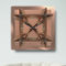 Moderne geometrische Kupfer-Wand-Uhr
