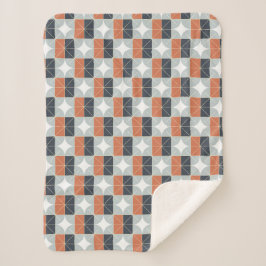 Moderne geometrische Terrakotta-Muster in Navy Sherpadecke