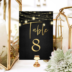 Moderne Gold & Schwarze Lichter Elegantes Skript Tischnummer