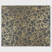 Moderne Goldkreise auf Holzkohlen-Schwarzem Geschenkpapier (Flach)