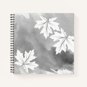 Moderne graue Aquarellfarben und Blätter aus weiße Notizblock