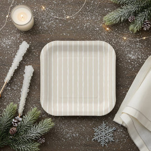 Moderne helle beigefarbene gestreifte Papierplatte Pappteller