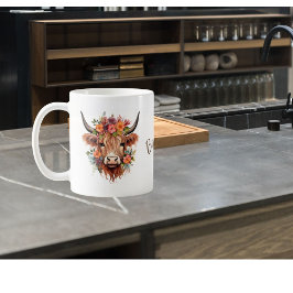 Moderne Hochland-Kuh mit Blume Kaffeetasse