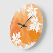 Moderne orangefarbene Aquarellspritze und Blätter  Große Wanduhr (Winkel)