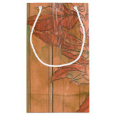 Moderne orangefarbene Blütendrucke auf gestreiftem Kleine Geschenktüte (Rückseite)