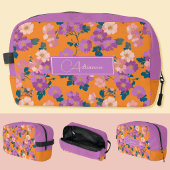 Moderne rosa und violette Blüten auf Orange Waschbeutel