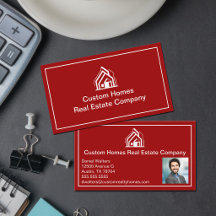 Moderne rote Immobilienfirma Makler Foto