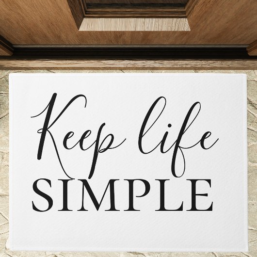 Moderne schwarze Keep Life Simple-Zitat Fußmatte