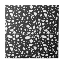 Moderne, schwarze Keramik mit weißem Dekor