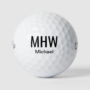 Moderne schwarze monogrammierte golfball