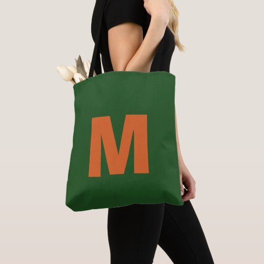 Moderne stilvolle grüne und orangefarbene Monogram Tasche (Von Nahem)