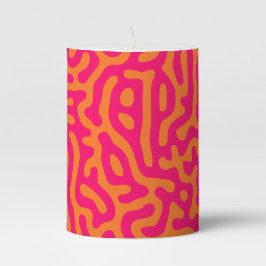 Moderne stilvolle orangefuchsia  stumpenkerze