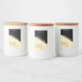 Moderne, stilvolle, pastellgelbe schwarze Kerzen i Lebensmitteletikett (Flaschen)