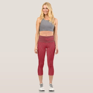 Moderne, zweifarbige rote Mustername und Geschäft Capri Leggings