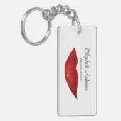 Moderner Cosmetology-Maskenbildner mit den roten Schlüsselanhänger (Vorderseite links)