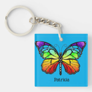 Moderner Farbenfroher Schmetterling im blauen Hint Schlüsselanhänger