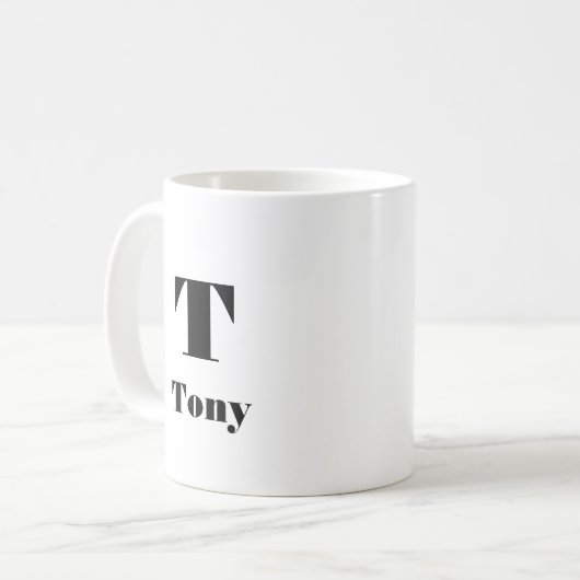 Moderner Name Anfangsbuchstabe Solid Color Schwarz Kaffeetasse (Vorderseite Links)