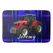 Moderner roter Traktor auf blau Badematte (Vorderseite)