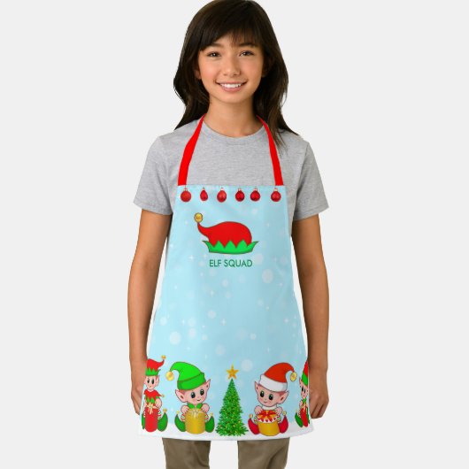 Moderner Weihnachtself-Squad auf Light Blue Schürze (Insitu)