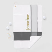 Moderner, weißer, grauer und goldgelber minimalist golfhandtuch (Insitu)