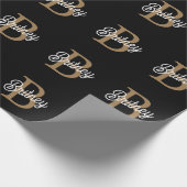 Modernes elegantes Monogramm Name Black Gold Scrip Geschenkpapier (Ecke)