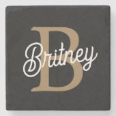 Modernes elegantes Monogramm Name Black Gold Scrip Steinuntersetzer (Vorderseite)