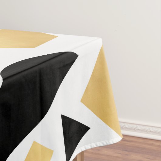 Modernes goldfarbenes Schwarz-weiß geometrisches M Tischdecke (Beispiel)