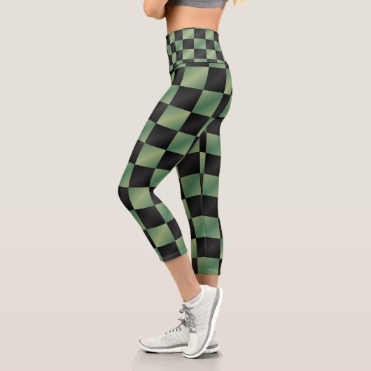 Modernes, grün-schwarzes Licht Capri Leggings (Links)