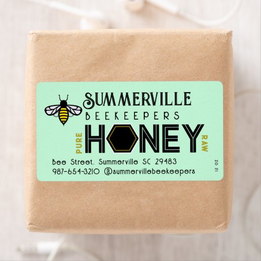 Modernes Honey-Label mit Hexagon-Grenze und Biene (Insitu)