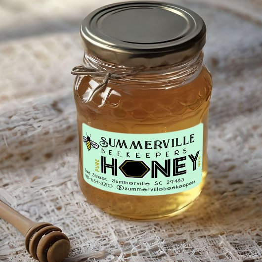 Modernes Honey-Label mit Hexagon-Grenze und Biene