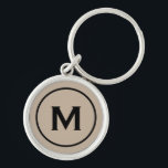 Modernes, minimales Beige-Schwarzes Monogramm Schlüsselanhänger<br><div class="desc">Personalisiert Modernes Minimal Mit Monogramm Schlüsselanhänger Monogram Initial Beige Black. Perfekt als Feriengeschenk,  Wiedersehen-Favoriten für Familien,  Dankeschön für Trauzeugen und Geschenk für jeden besondere Anlass.</div>