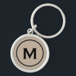 Modernes, minimales Beige-Schwarzes Monogramm Schlüsselanhänger<br><div class="desc">Personalisiert Modernes Minimal Mit Monogramm Schlüsselanhänger Monogram Initial Beige Black. Perfekt als Feriengeschenk,  Wiedersehen-Favoriten für Familien,  Dankeschön für Trauzeugen und Geschenk für jeden besondere Anlass.</div>